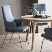 Stressless Laurel Dining Chair with Arms, High Back and D300 Legs in Freesia Light Blue fabric and Satin Silver metal